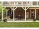 Outdoor patio area with spiral staircase and view of the backyard at 1143 Brookhaven North Cir, Brookhaven, GA 30319