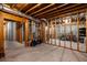 Unfinished basement ready for your creativity with exposed beams and concrete walls at 1143 Brookhaven North Cir, Brookhaven, GA 30319