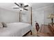 Bedroom with a canopy bed, overhead fan and a desk with chair at 1143 Brookhaven North Cir, Brookhaven, GA 30319