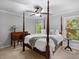 Comfortable bedroom featuring a four poster bed and a dresser at 1143 Brookhaven North Cir, Brookhaven, GA 30319