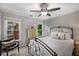 Cozy bedroom featuring an iron bed frame and modern decor at 1143 Brookhaven North Cir, Brookhaven, GA 30319