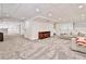 Finished basement with neutral carpet, a wooden cabinet, recessed lighting, and white walls at 1658 East Clifton Rd, Atlanta, GA 30307