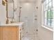 Modern bathroom featuring a glass shower, a white countertop and a light wood vanity at 1658 East Clifton Rd, Atlanta, GA 30307