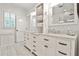 Bright bathroom with double vanity, marble countertop, and shiplap wall design at 1658 East Clifton Rd, Atlanta, GA 30307