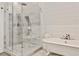 Bright bathroom features a standalone tub and a separate walk-in shower with neutral tile at 1658 East Clifton Rd, Atlanta, GA 30307