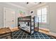 Bedroom features bunk beds, hardwood floors, shutters, and neutral color paint at 1658 East Clifton Rd, Atlanta, GA 30307