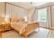 Bedroom featuring hardwood floors, natural light, and decorative curtains at 1658 East Clifton Rd, Atlanta, GA 30307