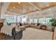 Spacious living room with a wood-paneled ceiling and an open connection to the dining area at 1658 East Clifton Rd, Atlanta, GA 30307