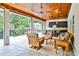 Beautiful outdoor patio with ceiling fan, bar area, and comfortable seating to enjoy the outdoors at 1658 East Clifton Rd, Atlanta, GA 30307