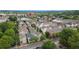 A neighborhood featuring various home styles, mature trees, walkable sidewalks and beautiful green hills in the distance at 169 Waterman Se St, Marietta, GA 30060