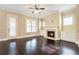 Inviting living room featuring hardwood floors, fireplace, and access to the outdoors at 169 Waterman Se St, Marietta, GA 30060