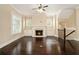 Bright living room with hardwood floors, a fireplace, and built-in cabinets at 169 Waterman Se St, Marietta, GA 30060