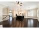 Open-concept living space that flows into the kitchen, featuring hardwood floors at 169 Waterman Se St, Marietta, GA 30060