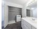 Convenient bath/laundry combination with modern fixtures and ample storage space at 27306 Plantation Ne Dr, Atlanta, GA 30324