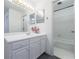 Bright bathroom with a white vanity, modern faucet, and shower/tub combination at 27306 Plantation Ne Dr, Atlanta, GA 30324