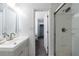 Clean and modern bathroom with a stylish vanity and walk-in shower at 27306 Plantation Ne Dr, Atlanta, GA 30324