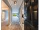 Inviting entryway leading to a living room and kitchen with modern finishes at 27306 Plantation Ne Dr, Atlanta, GA 30324