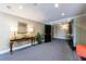 Bright hallway with decor and open doorway creates an inviting transition space in the building at 27306 Plantation Ne Dr, Atlanta, GA 30324