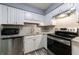 Well-equipped kitchen with stainless steel appliances and granite countertops at 27306 Plantation Ne Dr, Atlanta, GA 30324