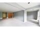 Spacious living room with neutral walls and plush carpet throughout at 27306 Plantation Ne Dr, Atlanta, GA 30324