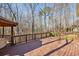 Large wooden deck overlooking a lush, wooded backyard at 2975 Coles Way, Atlanta, GA 30350