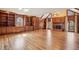 Spacious living room featuring built-in bookcases, hardwood floors, and a fireplace at 2975 Coles Way, Atlanta, GA 30350