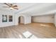 Large living room featuring neutral walls, hardwood floors and ceiling fan at 2975 Coles Way, Atlanta, GA 30350