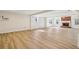 Expansive living room featuring hardwood floors, fireplace, and recessed lighting at 2975 Coles Way, Atlanta, GA 30350