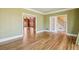 Dining room featuring crown molding, hardwood floors, and french doors at 2975 Coles Way, Atlanta, GA 30350