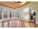 Inviting sunroom with skylight, wood ceiling and French doors to a deck at 2975 Coles Way, Atlanta, GA 30350