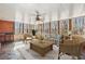 Relaxing sunroom featuring lots of windows and cozy wicker furniture at 2975 Coles Way, Atlanta, GA 30350