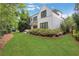 Expansive backyard featuring a manicured lawn and a patio perfect for outdoor relaxation at 3920 Cash Lndg, Marietta, GA 30066
