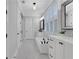 Luxurious bathroom featuring marble floors, double vanity sinks, and freestanding tub at 3920 Cash Lndg, Marietta, GA 30066