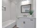 Bathroom features subway tile shower, granite counters and modern fixtures at 3920 Cash Lndg, Marietta, GA 30066
