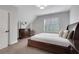 Bedroom with hardwood floors, plantation shutters and decorative dresser at 3920 Cash Lndg, Marietta, GA 30066