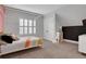 Bright bedroom featuring a modern bed frame, gray walls and carpet, and a built-in closet at 3920 Cash Lndg, Marietta, GA 30066