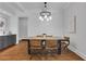 Open dining room with contemporary table and unique chairs at 3920 Cash Lndg, Marietta, GA 30066