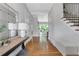Inviting foyer with hardwood floors, elegant console table, and staircase at 3920 Cash Lndg, Marietta, GA 30066