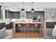 Bright kitchen featuring gray cabinets, a large island with seating, and stainless steel appliances at 3920 Cash Lndg, Marietta, GA 30066