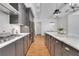 Spacious kitchen with gray cabinets, marble countertops, and stainless steel appliances at 3920 Cash Lndg, Marietta, GA 30066
