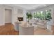 Bright living room with a marble fireplace, comfortable seating, and natural light from a large sliding glass door at 3920 Cash Lndg, Marietta, GA 30066