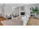 Spacious living room featuring a marble fireplace, comfortable seating, and natural lighting at 3920 Cash Lndg, Marietta, GA 30066