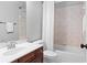 Cozy bathroom featuring bath and shower combination and vanity with sink at 109 Hawks Bnd, Canton, GA 30115