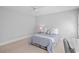 Neutral bedroom with soft lighting and comfortable bed, creating a serene space at 109 Hawks Bnd, Canton, GA 30115