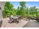 Outdoor deck area with comfortable seating and backyard views at 109 Hawks Bnd, Canton, GA 30115