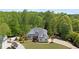 Charming two-story home with a manicured lawn, inviting porch, and beautiful landscaping at 109 Hawks Bnd, Canton, GA 30115