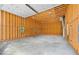 Spacious garage interior with exposed wood framing, concrete floor and natural lighting at 109 Hawks Bnd, Canton, GA 30115