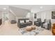 Relaxing living room featuring neutral tones, comfortable seating, and stylish decor at 109 Hawks Bnd, Canton, GA 30115