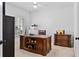 Spacious office with built-in shelves, plantation shutters, and a leather top desk at 109 Hawks Bnd, Canton, GA 30115