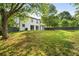 Expansive backyard with a privacy fence, mature trees, and plenty of green space at 1758 Bridgestone Ct, Marietta, GA 30066